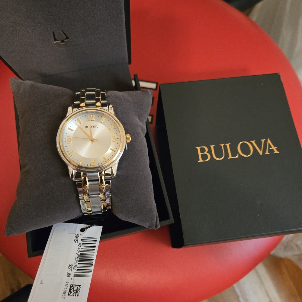 Men Bulova Watch silver dial with gold Arabic and stick markers. Retails…